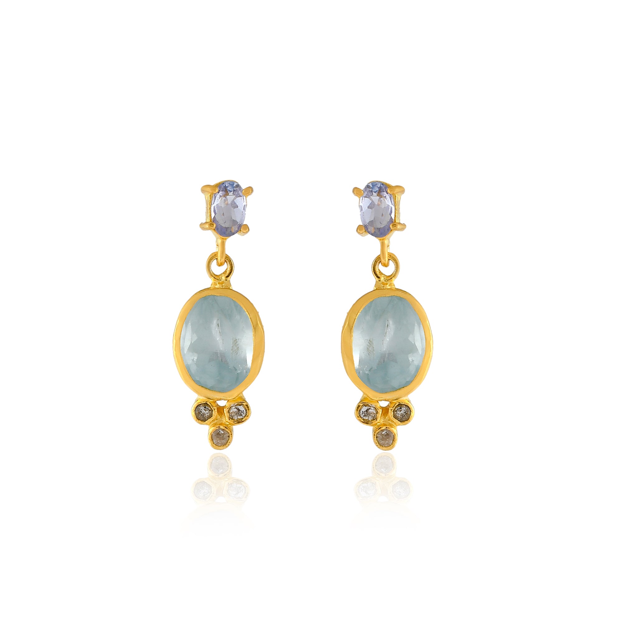 Tanzanite in Prong Setting with a drop of bezeled faceted Aquamarine with three diamonds