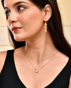 Emerald Glow Three-Stone Earrings
