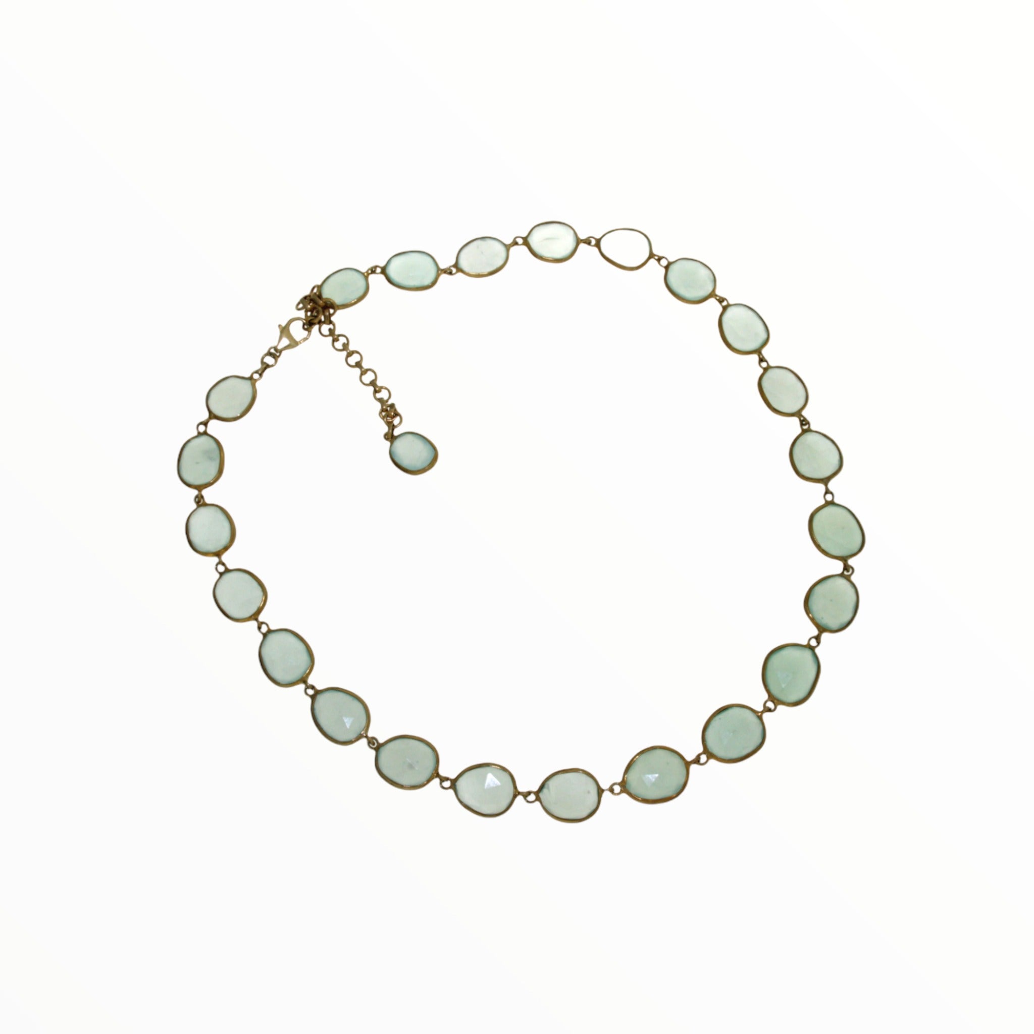 Organic oval shaped aqua chalcedony in a necklace