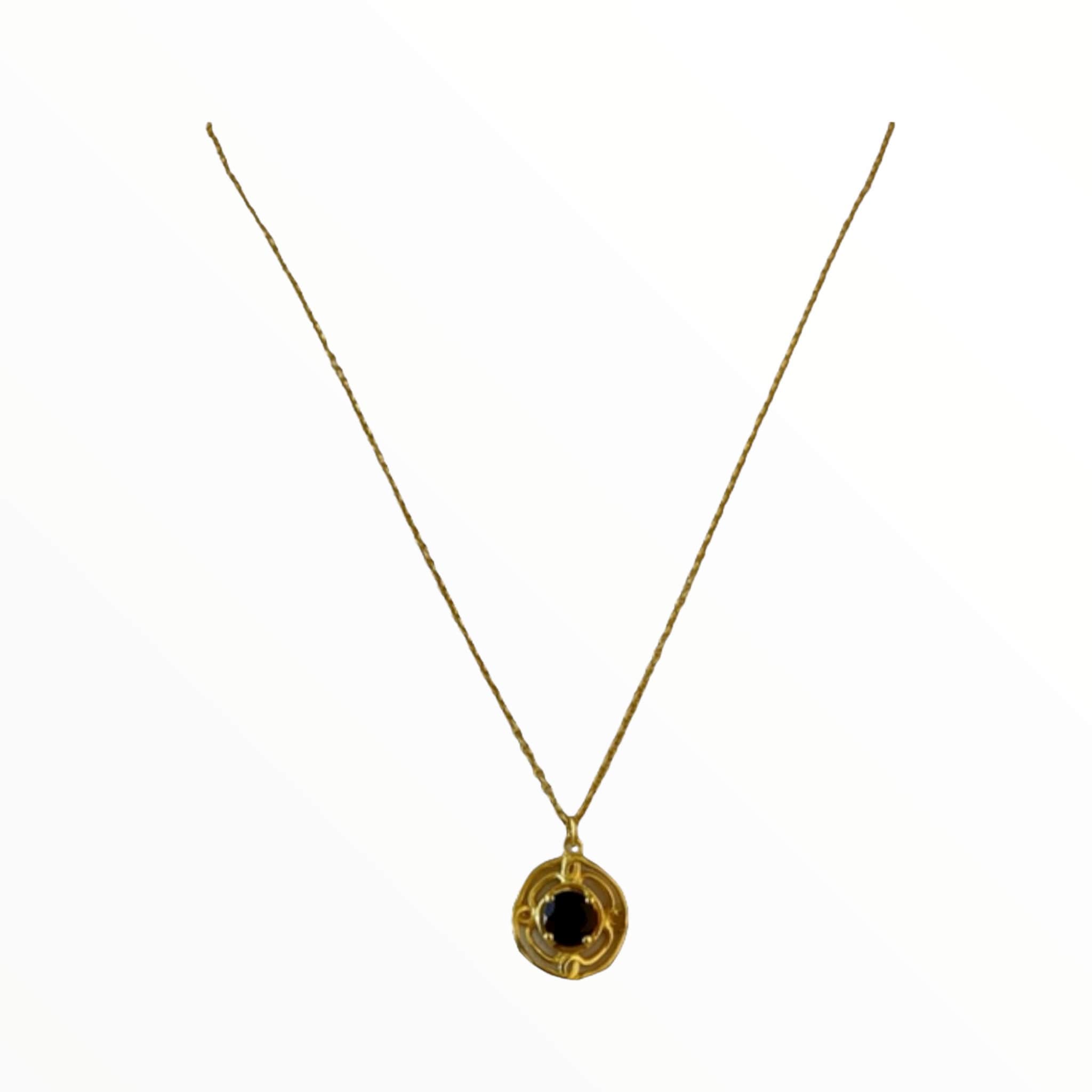 Garnet flower with gold frame